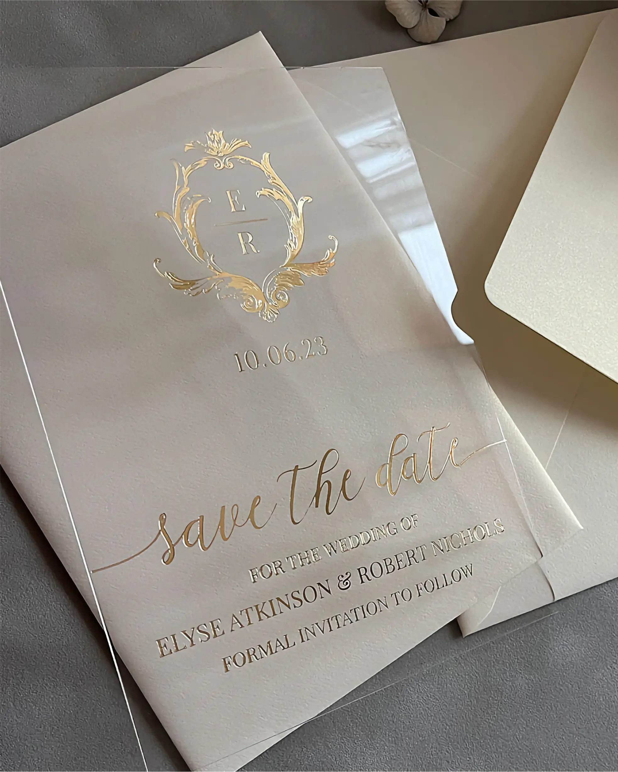 Isabelle Save the Date acrylic card with gold foil monogram crest and cream envelope — Polina Perri